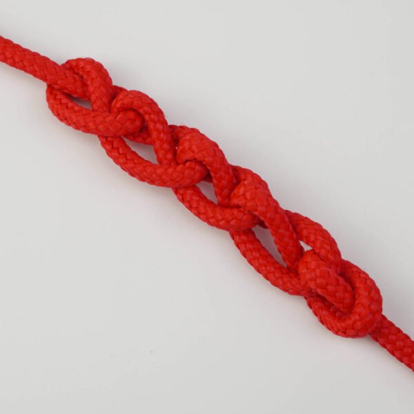 5mm Red Hot rope in a sennit, demonstrating its secure fit and striking appearance.